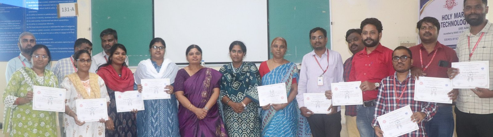 HITS faculty with certificates of achievement